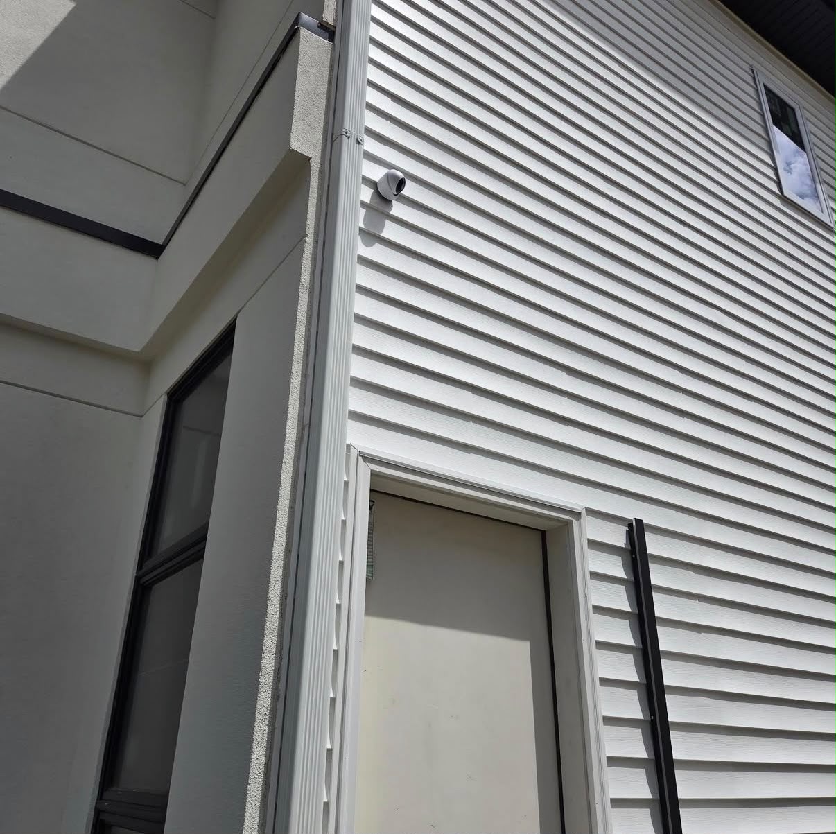Video doorbell installed cleanly on a stone entry pillar